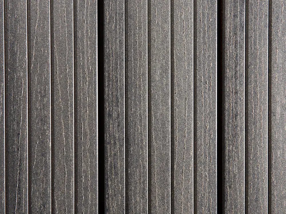 00022428~~05~die-kompakte-plus-wpc-terrassendielen-granitgrau-grob-fein-gebuerstet-hohlkammerprofil
