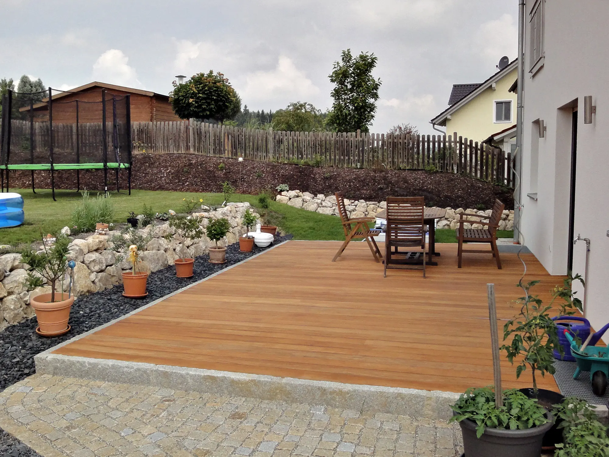 00003164~~03~Garapa_Terrassendielen_KD_PREMIUM_25x145_mm_glatt_glatt